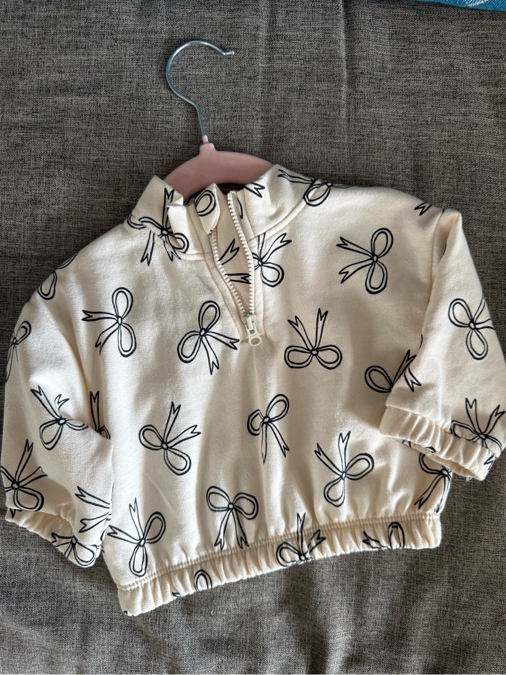 Cat & Jack Cream Pullover Hoodie with Black Bow Print